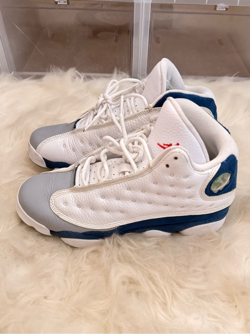Air Jordan 13s in White and Blue with Gray Toe Cap